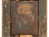 an old wooden picture frame with a piece of paper on it