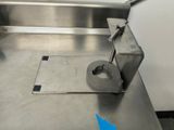 an image of a stainless steel toilet in a bathroom