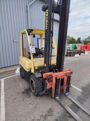 a forklift that is parked in a parking lot