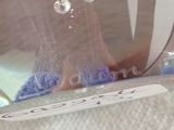 a close up of a person ' s feet in a glass of water
