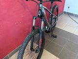 a bicycle that is leaning against a wall