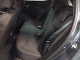 the back seats of a car with a seat belt in a car