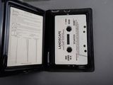 a cassette sitting in a case on a table