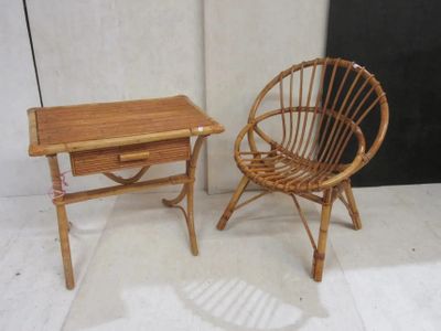 two chairs and a table in the corner of a room