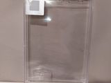 a picture of a clear plastic box with a button on it