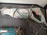 a drill and other tools on the table