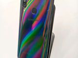 the back of a samsung galaxy s9 phone with a multicolored design