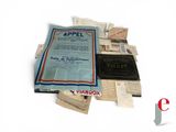an image of a bunch of papers and a book on a table
