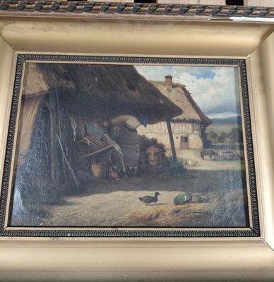 une photo d'un tableau représentant une scène de vie à la ferme, dans un cadre doré