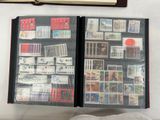 a lot of stamps on the pages of a book