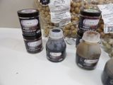many jars of food that are on the counter