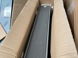 a person holding a box that has a computer inside of it