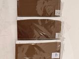 a picture of a stack of brown and white paint samples