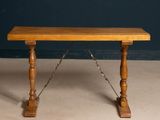 an image of a wooden table with two legs and a wooden top