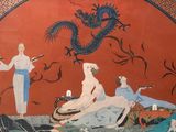 une photo d'un tableau représentant un dragon accroché au mur