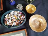 a bowl of candy and a bowl of candy on a table