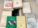 many books that are sitting on top of a table