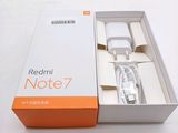 a white box with a redmi note 7 and a white box with a redmi note 7 in it
