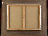 an old picture frame sitting on top of a wooden easel