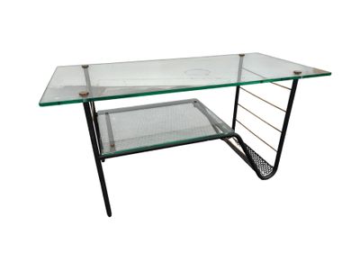 the glass table has a metal frame and a glass top