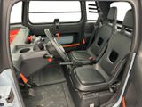 the interior of a vehicle with two seats and a steering wheel