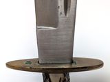 a knife that is on top of a wooden table