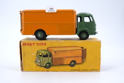 a toy truck that is sitting on top of a box