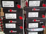 several boxes of u - power products are stacked on top of each other
