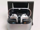 a pair of headphones in a case on a table