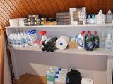 many bottles of water on the shelves in the room