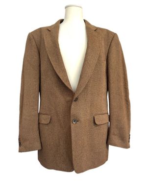the jacket is brown and has buttons on the front of it