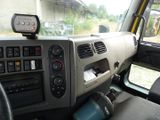 a dashboard of a truck with a camera on the dash