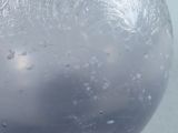 a close up of a glass vase with frost on it