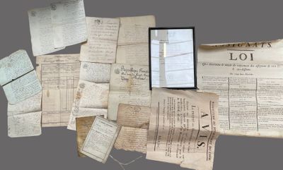 a pile of old papers and papers on a table