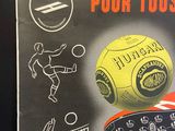 a poster on the wall of a soccer game