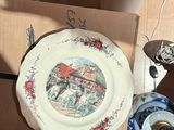 a plate that is sitting on top of a cardboard box