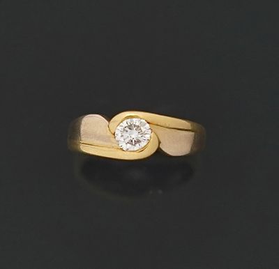 Bague en deux tons d'or jaune et gris 18K 750 millièmes orné…