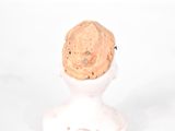 a white vase with a cork in it that has a cork in it