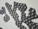 a black and white drawing of a bunch of grapes