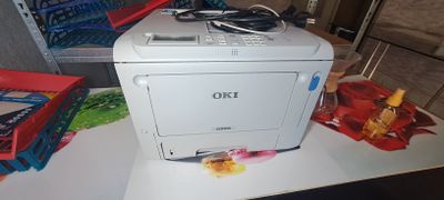 a white printer sitting on top of a table