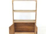 a wooden shelf with two open shelves on it