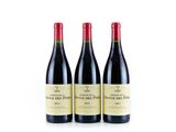 three bottles of red wine on a white background