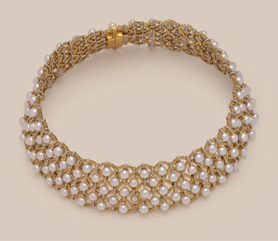 a gold and pearl necklace