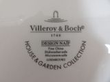 a white plate with a black and white design on it