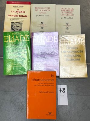 several books sitting on a table next to each other on a table