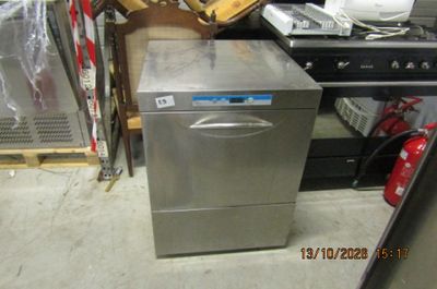 an image of a dishwasher sitting in a warehouse