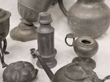 many different types of metal items on a table
