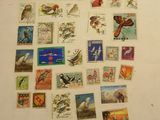 a lot of stamps on the wall of a room