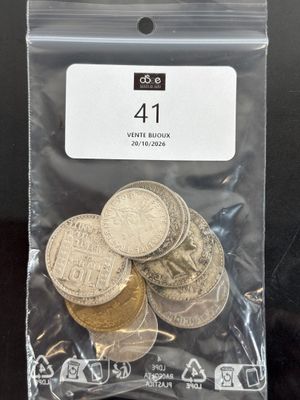 a bag of coins sitting on top of a table