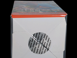 a box with a clock inside of it on a black background
